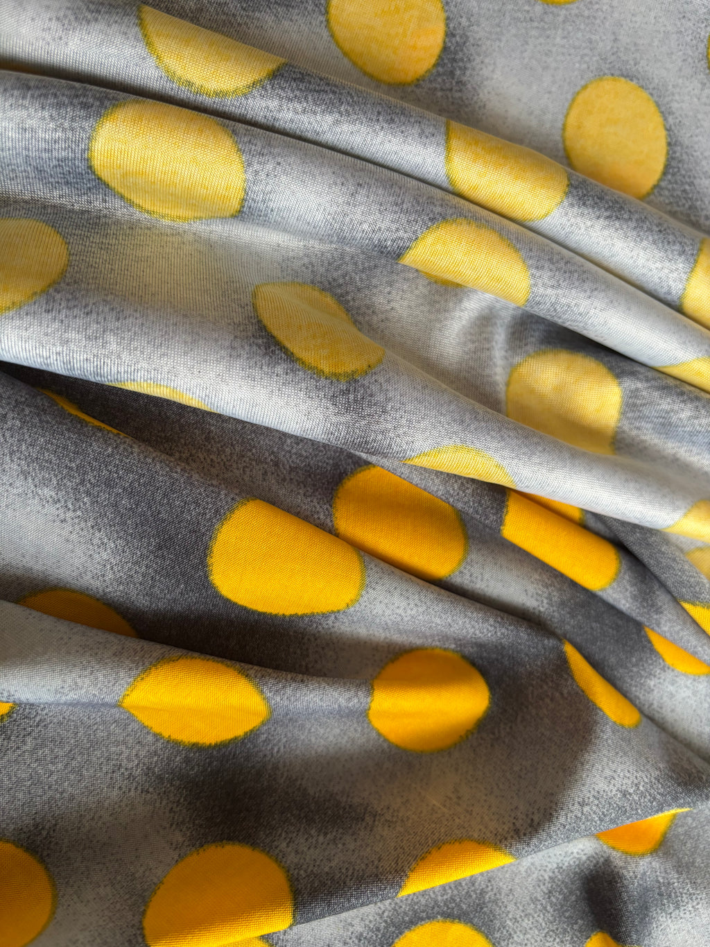 YELLOW POLKA DOTS INTERLOCK