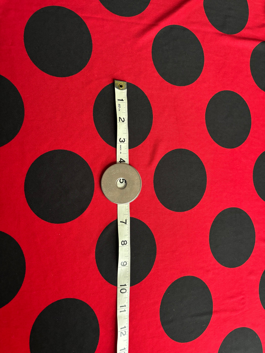 RED WITH BLACK POLKA DOTS