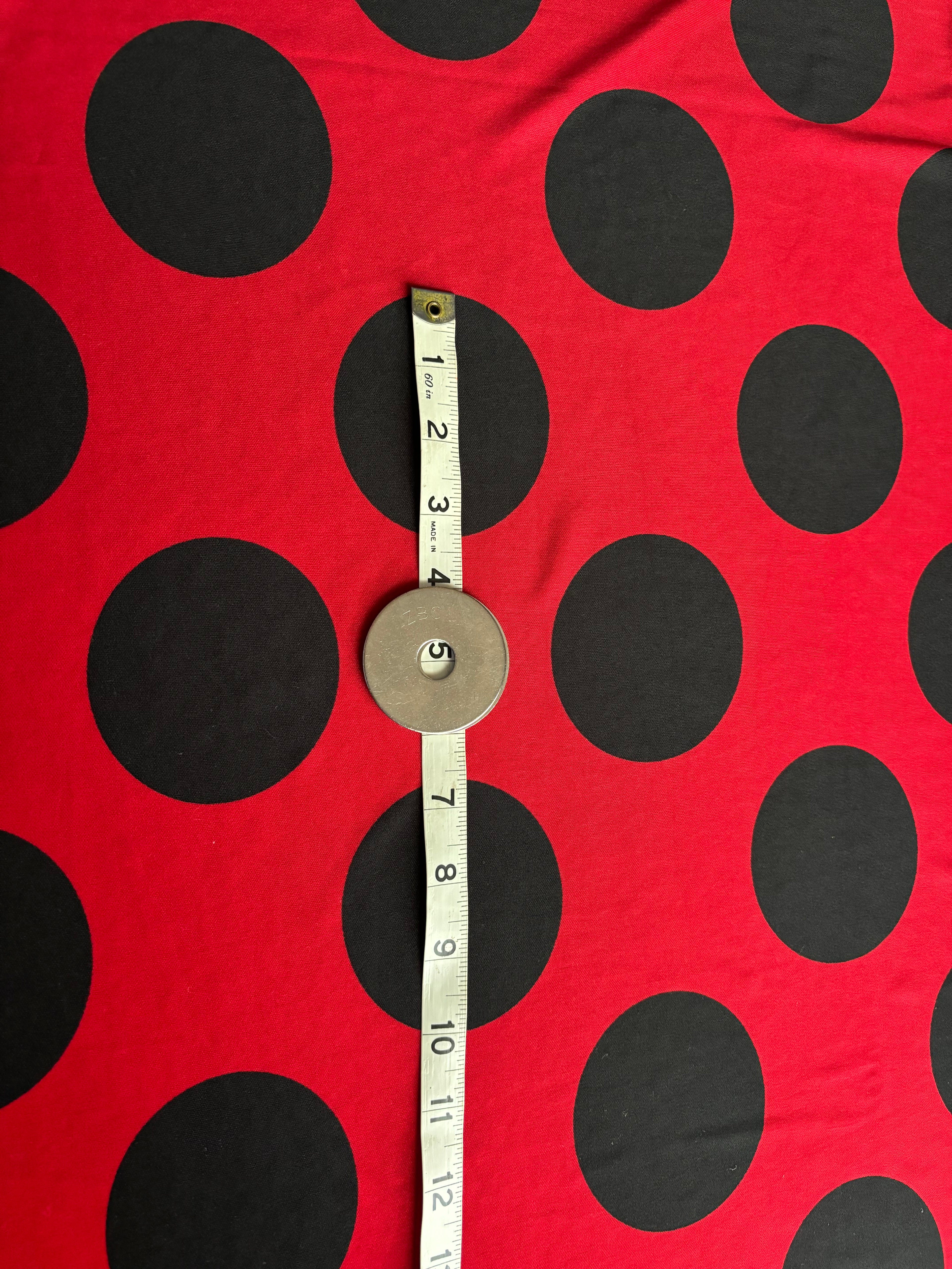 RED WITH BLACK POLKA DOTS