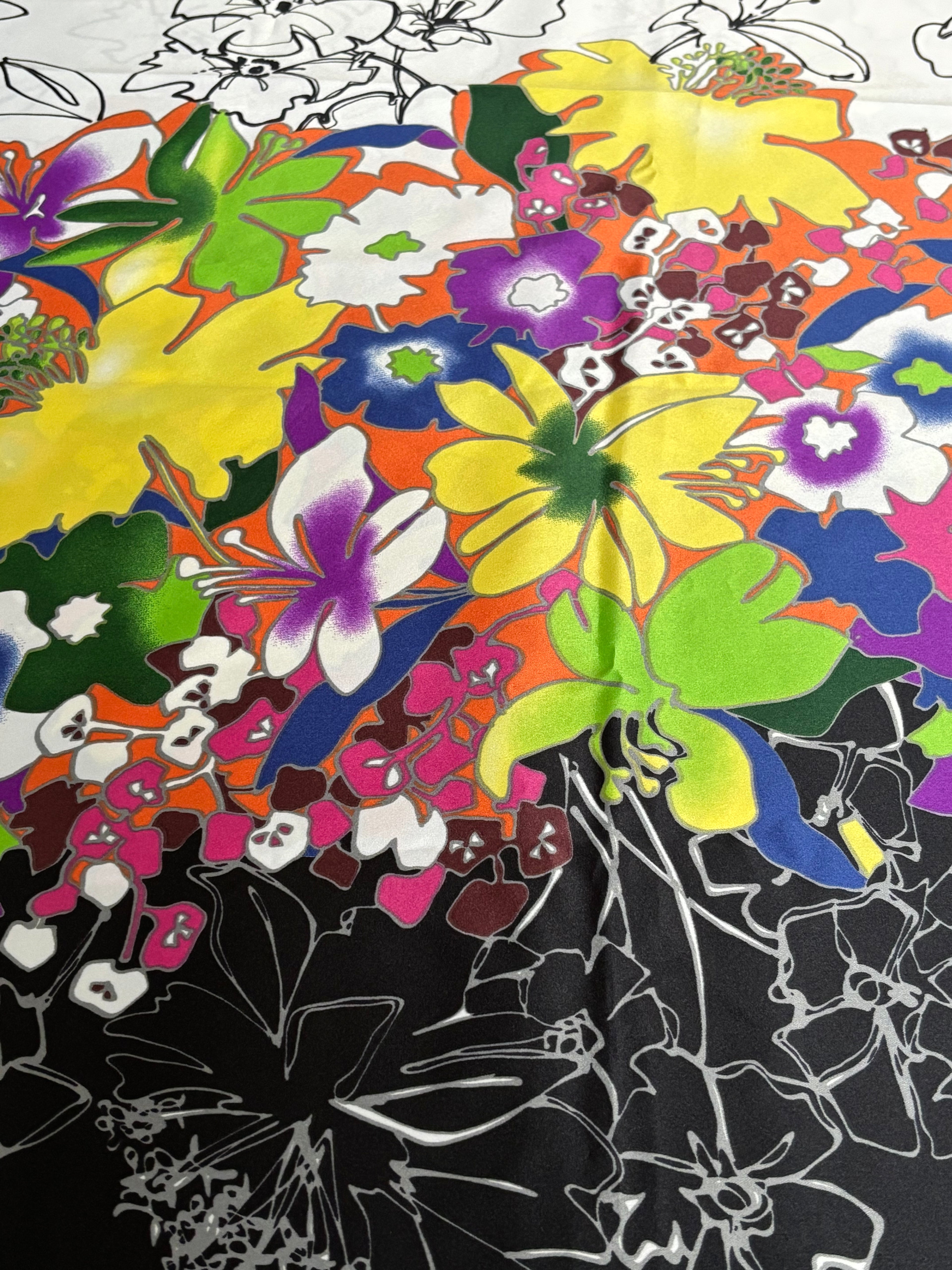 MULTI COLORED ONE-SIDED FLORAL BORDER PRINT