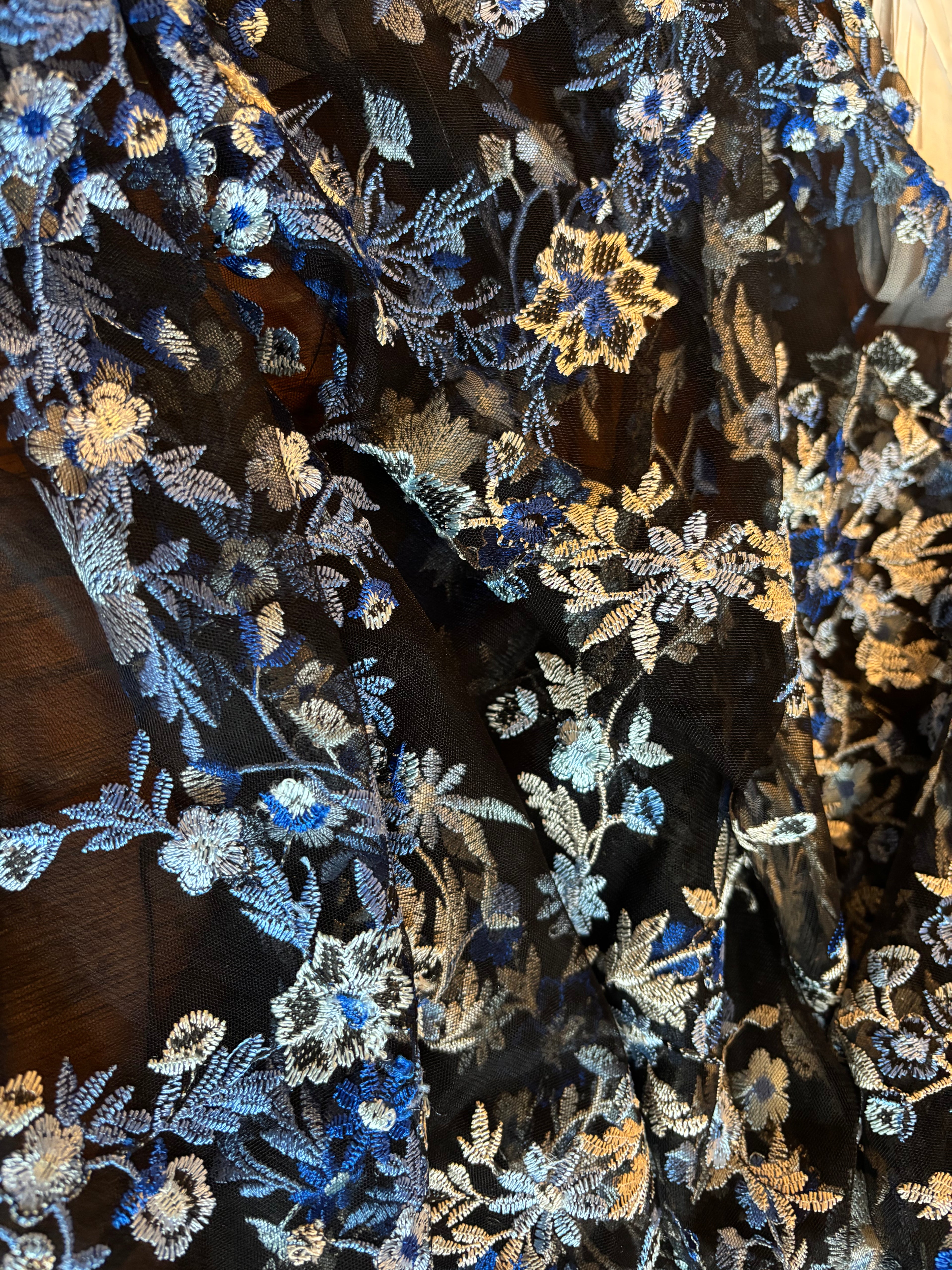 SHADES OF BLUE EMBROIDERED LACE ON BLACK MESH FABRIC