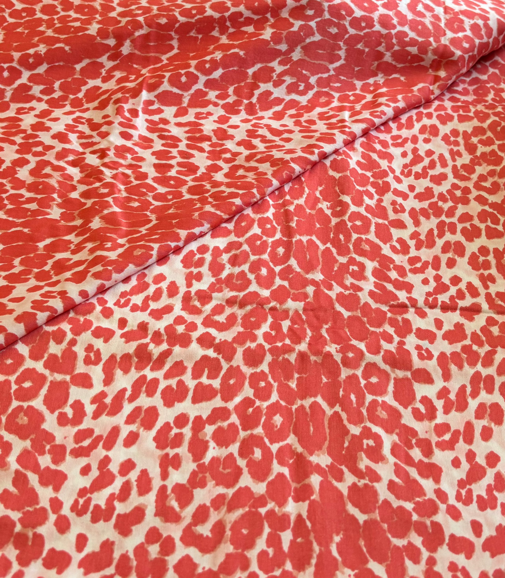 SALMON AND WHITE ANIMAL PRINT