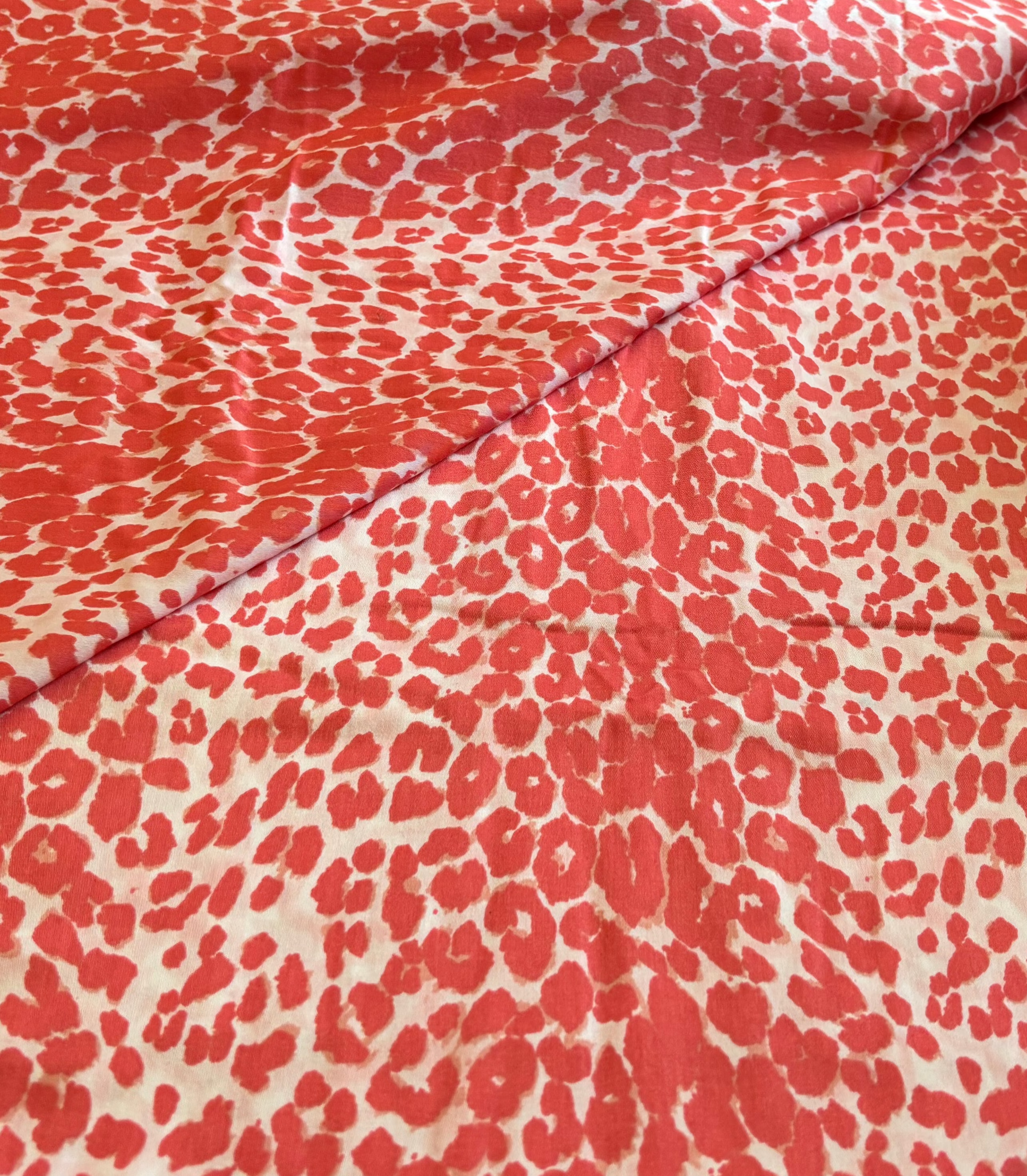 SALMON AND WHITE ANIMAL PRINT
