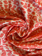 SALMON AND WHITE ANIMAL PRINT