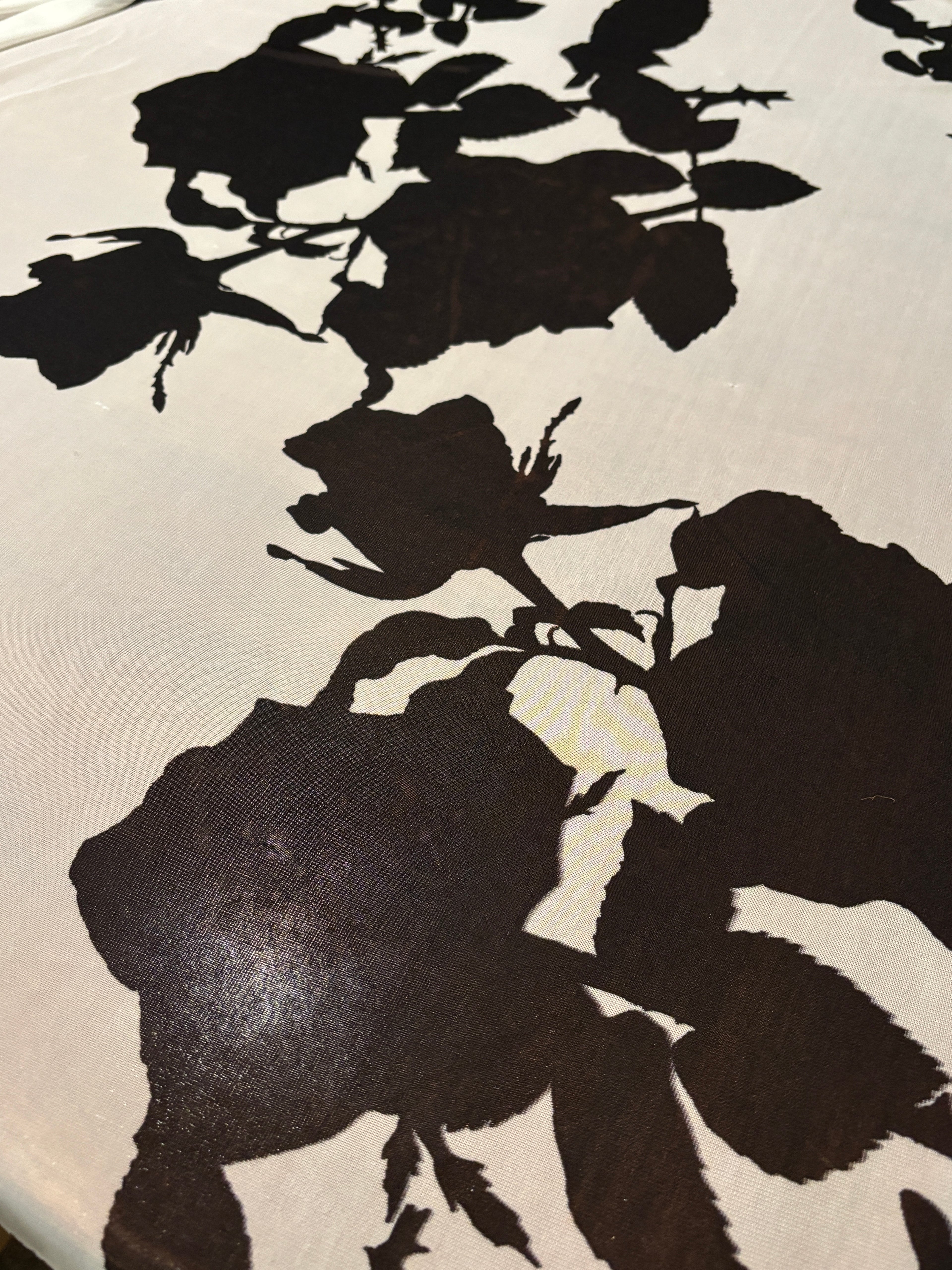 BLACK FLORALS ON WHITE TRICOT KNIT