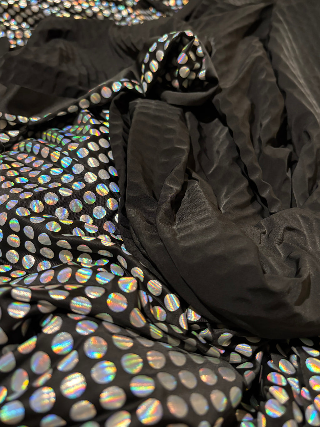 BLACK WITH IRIDESCENT CIRCLES ACTION KNIT