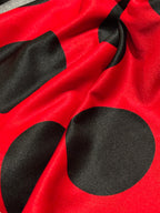 RED WITH BLACK POLKA DOTS