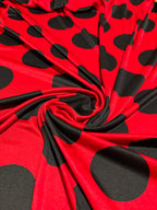 RED WITH BLACK POLKA DOTS