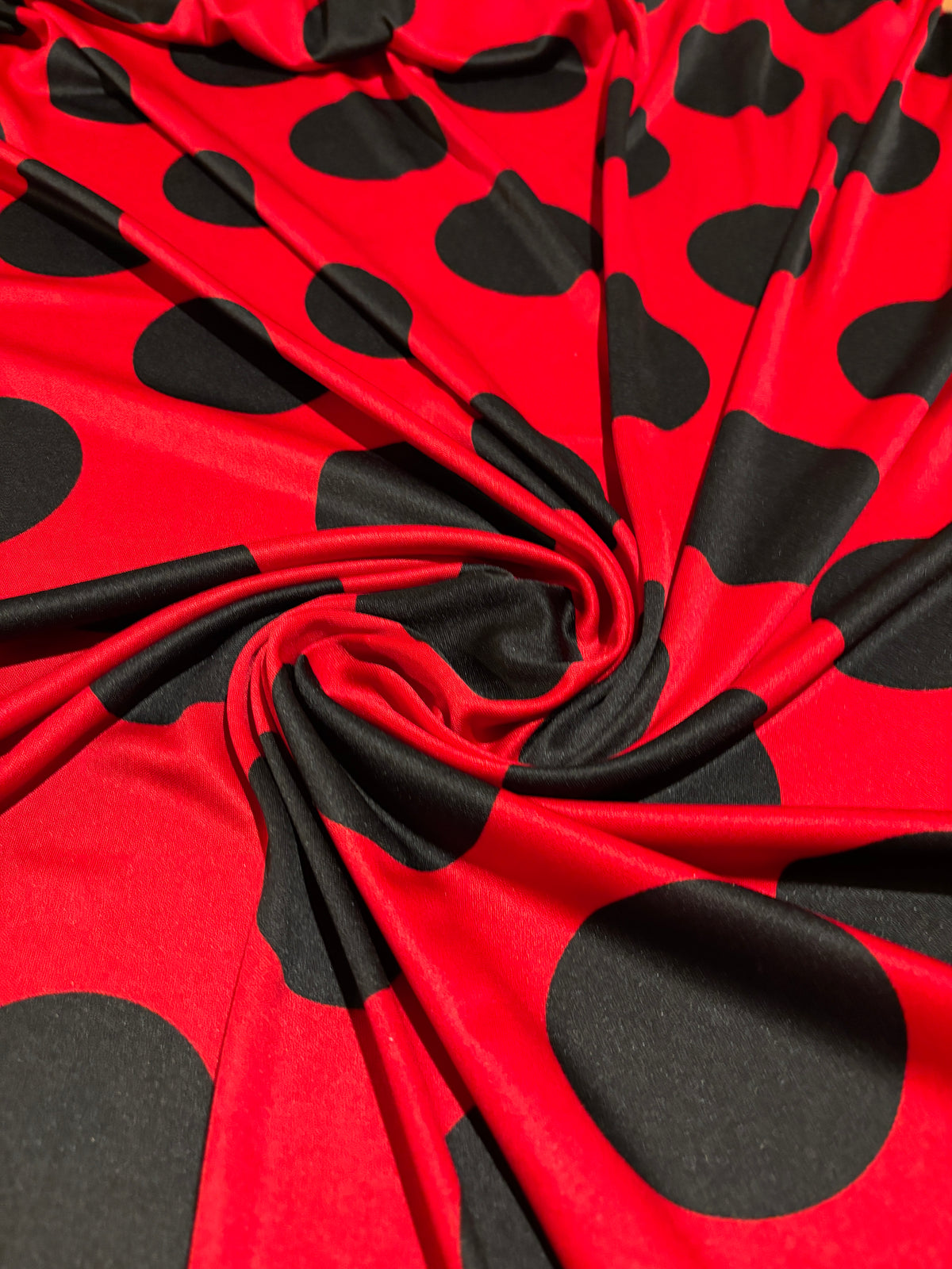 RED WITH BLACK POLKA DOTS