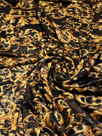 GOLD SCROLLS ON BLACK BACKGROUND