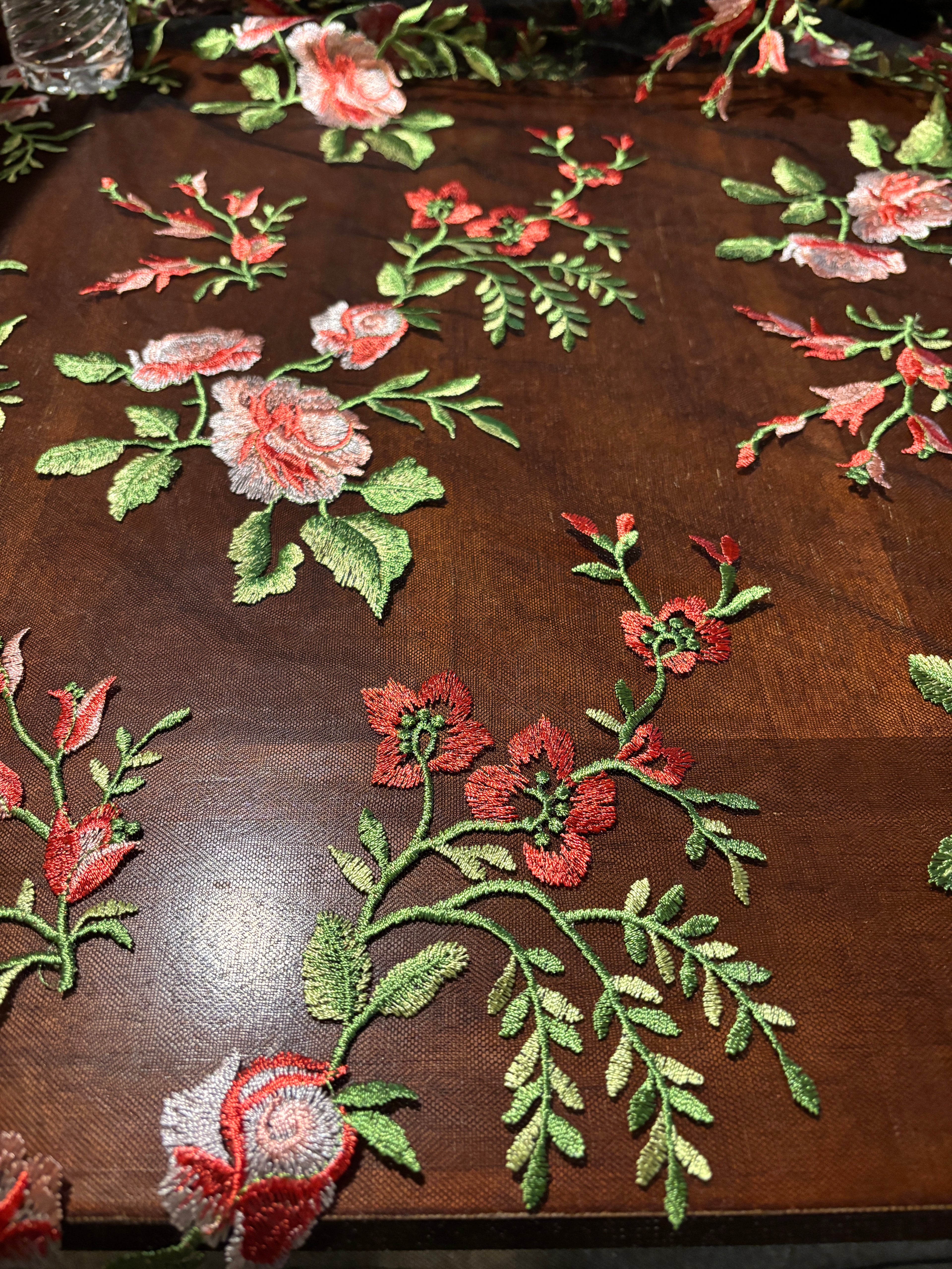 BLACK LACE WITH PINK ROSES AND GREEN LEAVES