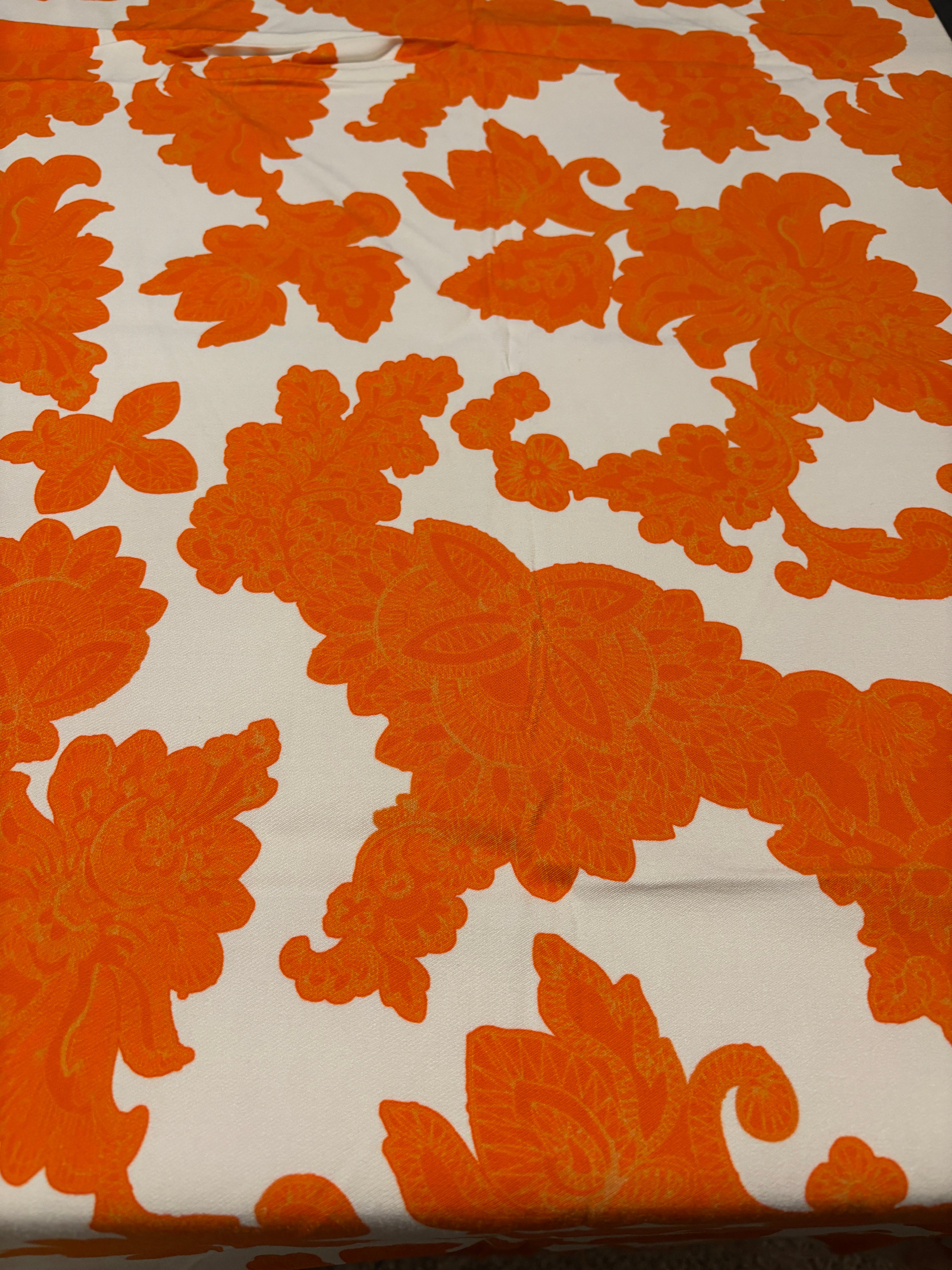 STRETCHY ORANGE FLORALS FROM NYC