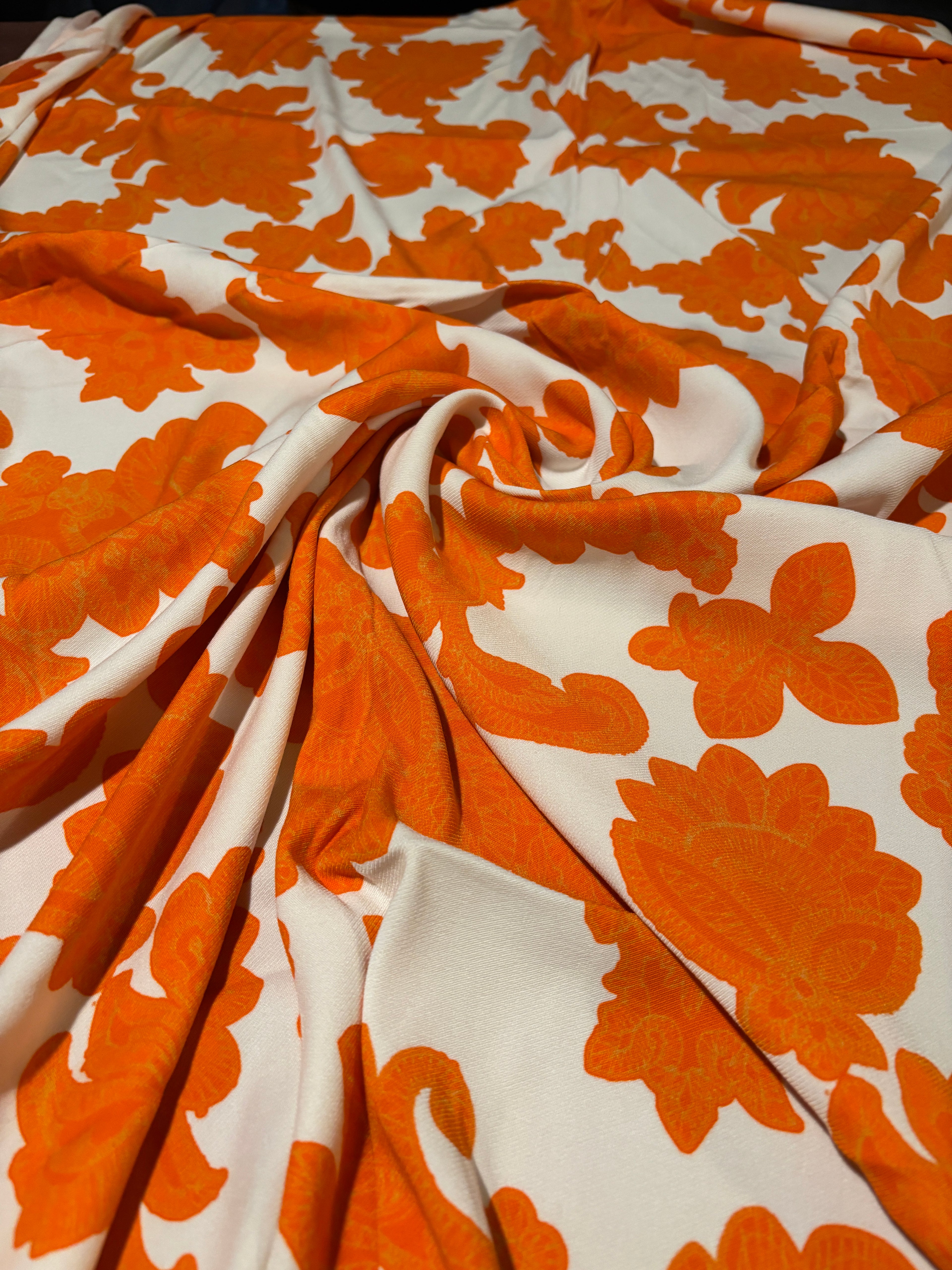 STRETCHY ORANGE FLORALS FROM NYC