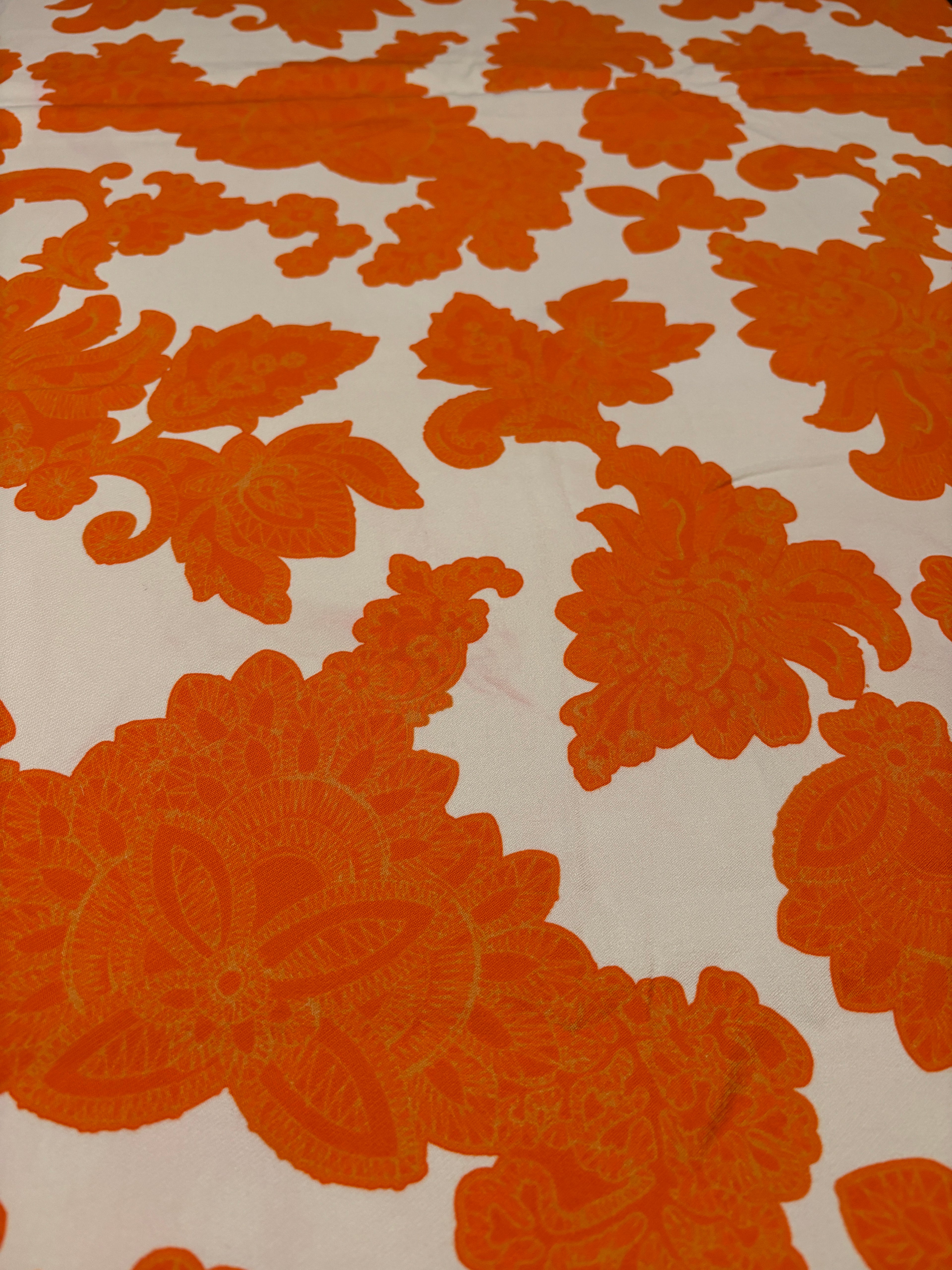 STRETCHY ORANGE FLORALS FROM NYC