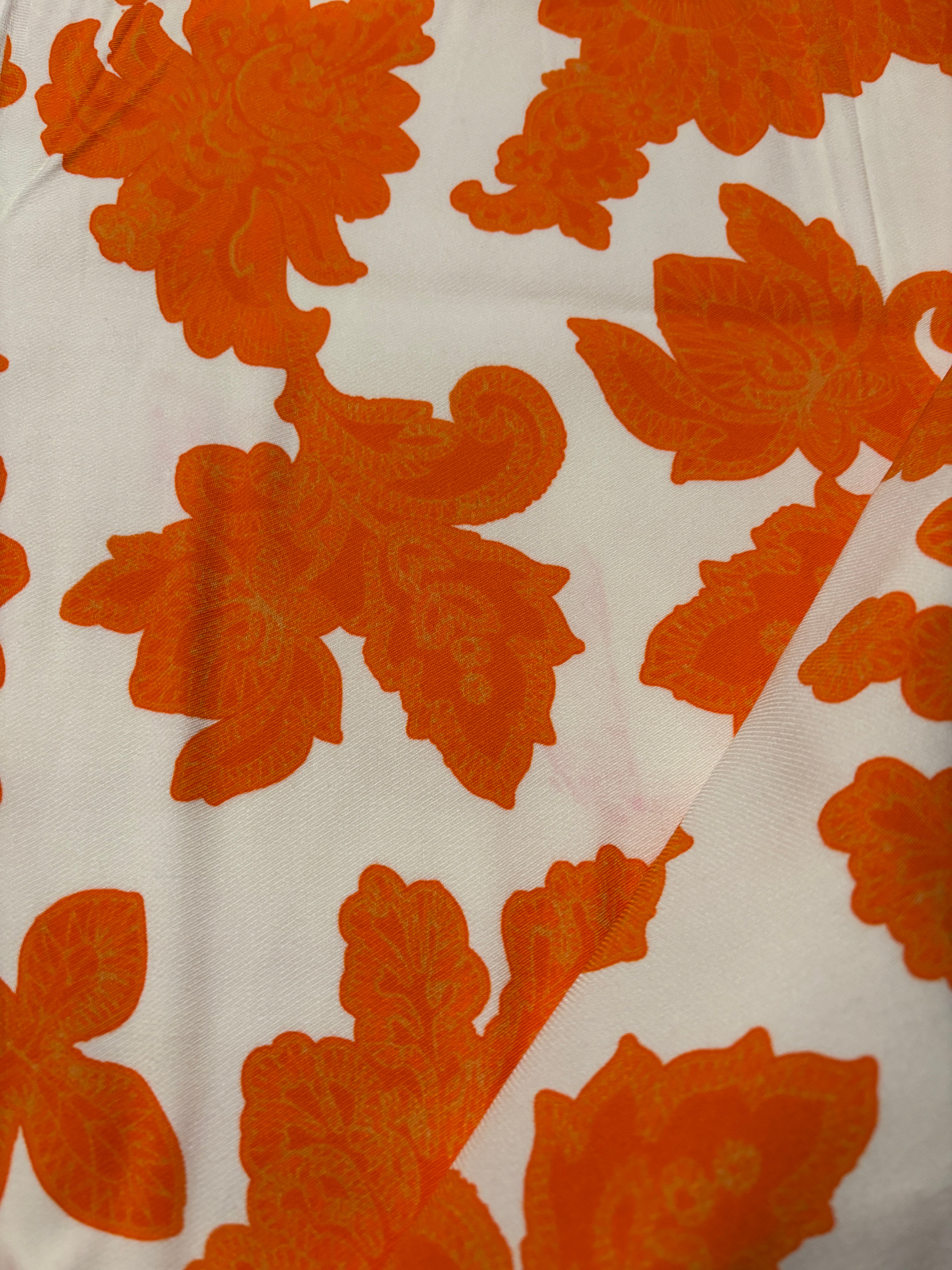 STRETCHY ORANGE FLORALS FROM NYC