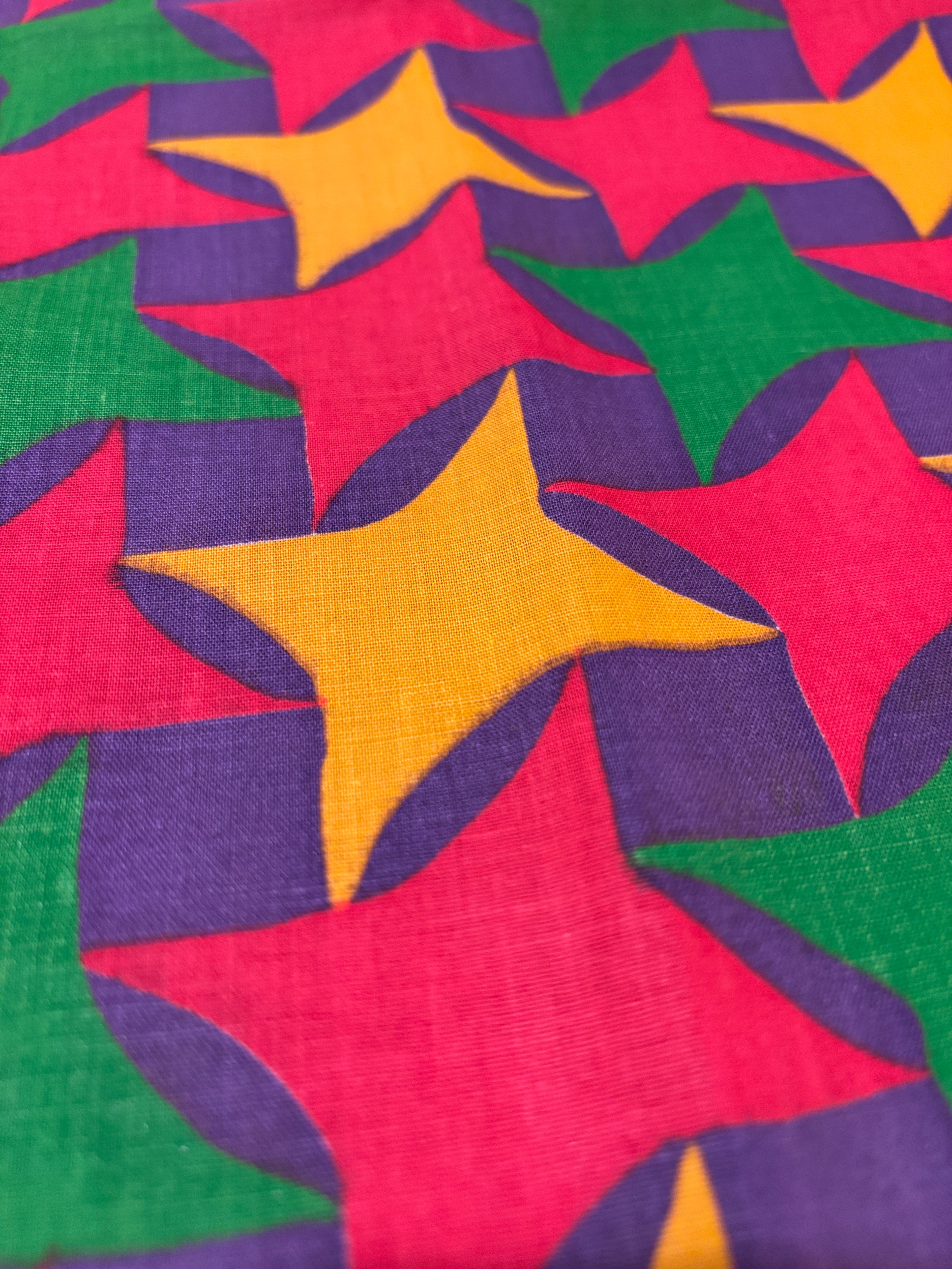 VINTAGE MULTI COLORED STAR LIKE FABRIC