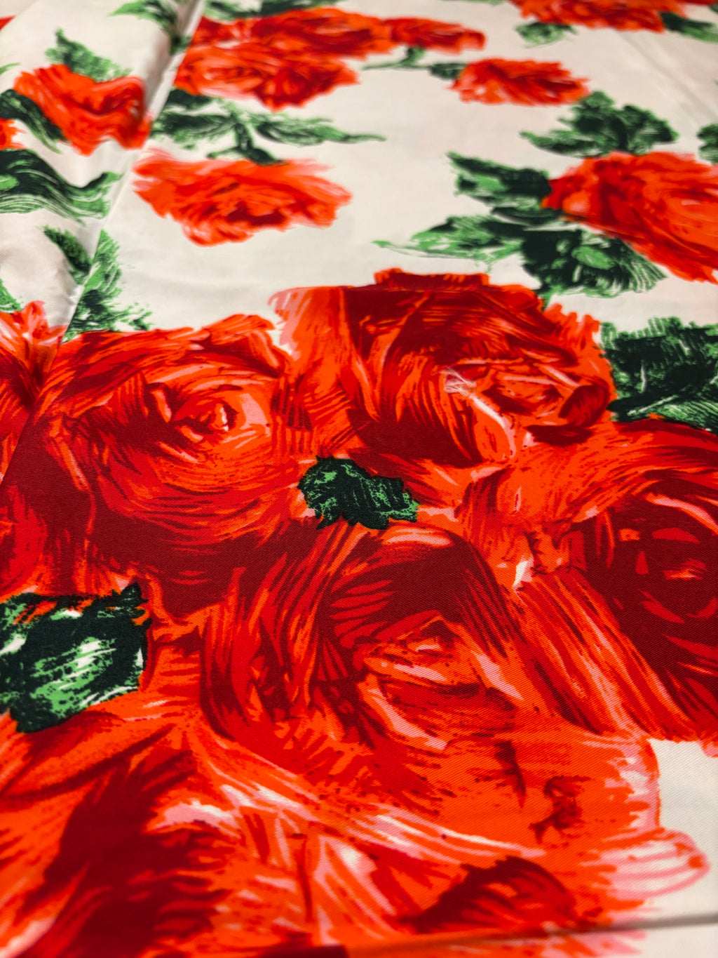 BIG RED FLOWERS AND GREEN LEAVES