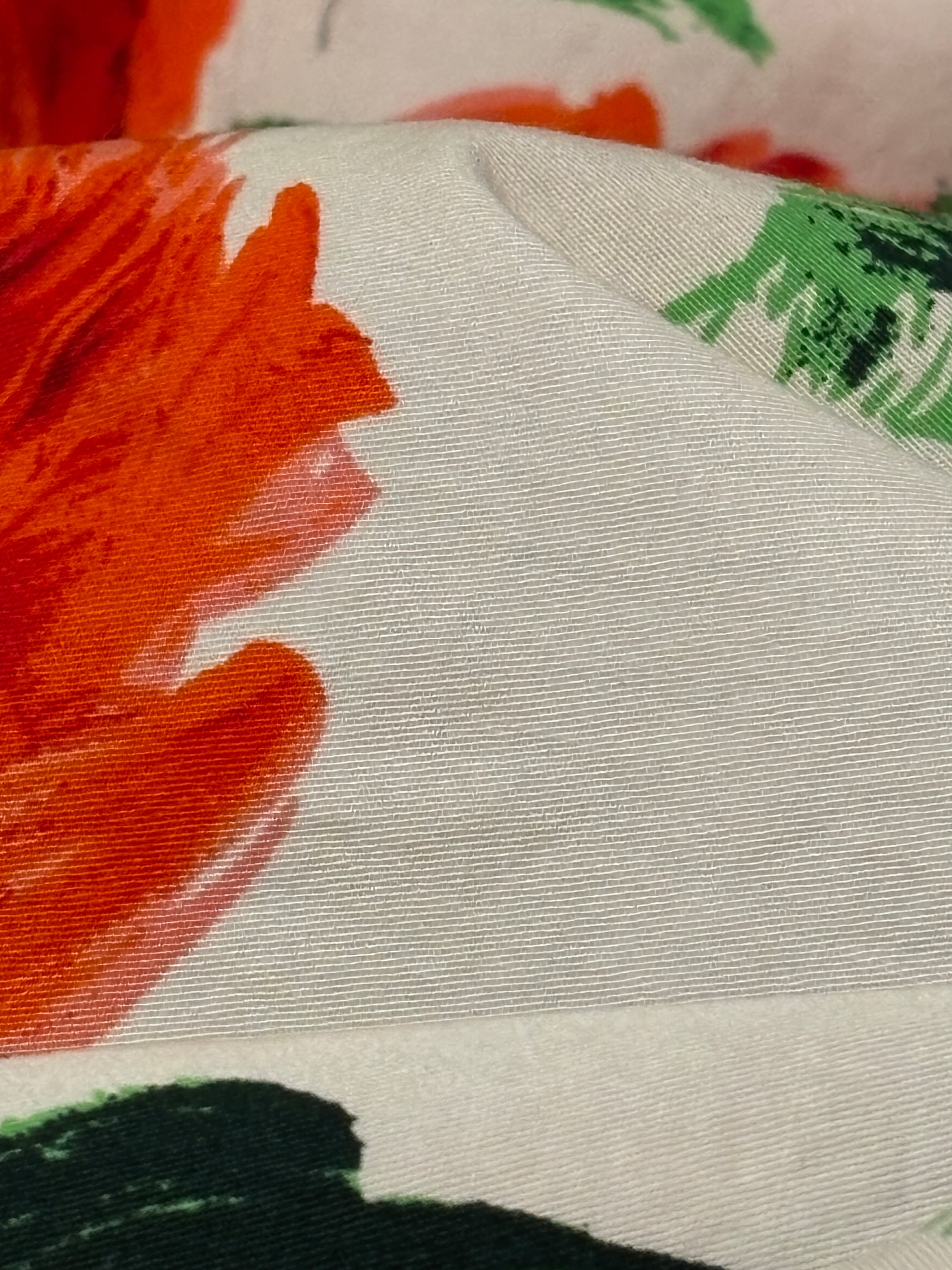 BIG RED FLOWERS AND GREEN LEAVES